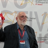 Nenad Puhovski receiving the award for Tatjana Božić - Director of HAPPILY EVER AFTER, Special Jury Mention, Competition Programme - Documentary Film, Festival Awards, Sarajevo Film Festival, 2014 (C) Obala Art Centar