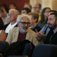 Elia Suleiman, President of the Competition Programme - Feature Film Jury, in conversation with Nikola Đuričko, member of the Competition Programme - Feature Film Jury, before the Competition Programme Preview Screening: THE BLACK PIN, Competition Programme - Features, National theatre, 22. Sarajevo Film Festival, 2016 (C) Obala Art Centar