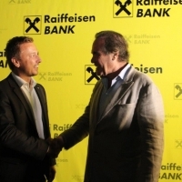 Karlheinz Dobnigg, CEO & Chairman of the Board of Raiffeisen Bank with director Oliver Stone, Raiffeisen Bank Cocktail Reception, 23. Sarajevo Film Festival, 2017 (C) Obala Art Centar