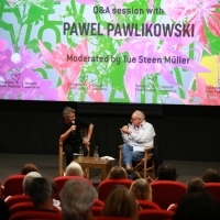 Director Pawel Pawlikowski and moderator Tue Steen Müller, Q&A session, Tribute to Pawel Pawlikowski, Meeting Point Cinema, 25th Sarajevo Film Festival, 2019 (C) Obala Art Centar