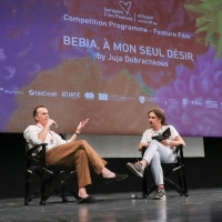 Producer John Stephen Minervino and moderator Đorđe Krajišnik, Competition Programme Press Conference: Bebia, à mon seul désir, National Theater, 27th Sarajevo Film Festival, 2021 (C) Obala Art Centar